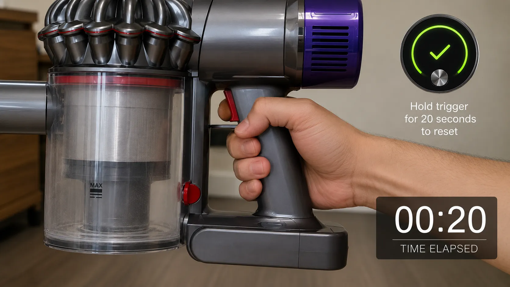 Hand holding a cordless vacuum trigger for 20 seconds as the warning light clears after the reset.