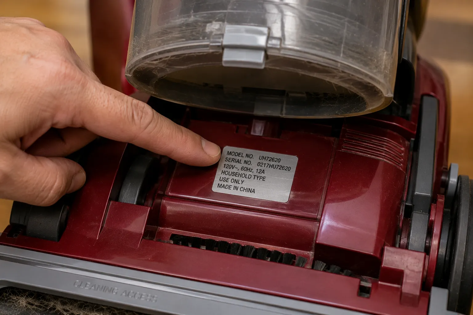 vacuum model number label location on an upright base used for belt replacement lookup