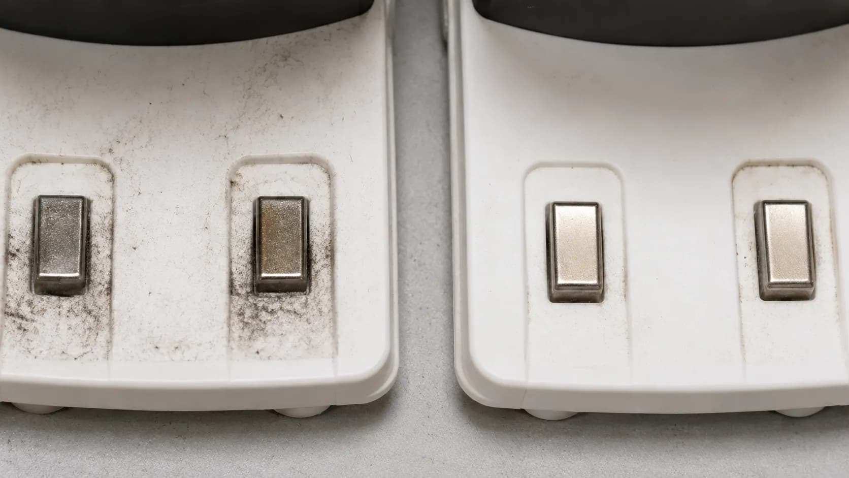Side-by-side comparison of Clean Base and standard Home Base charging contacts showing different levels of dust buildup after fourteen days without cleaning.